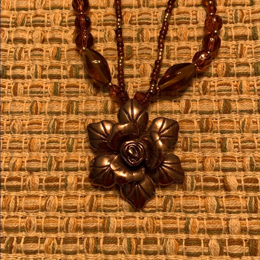 Rose gold tone & amber color necklace